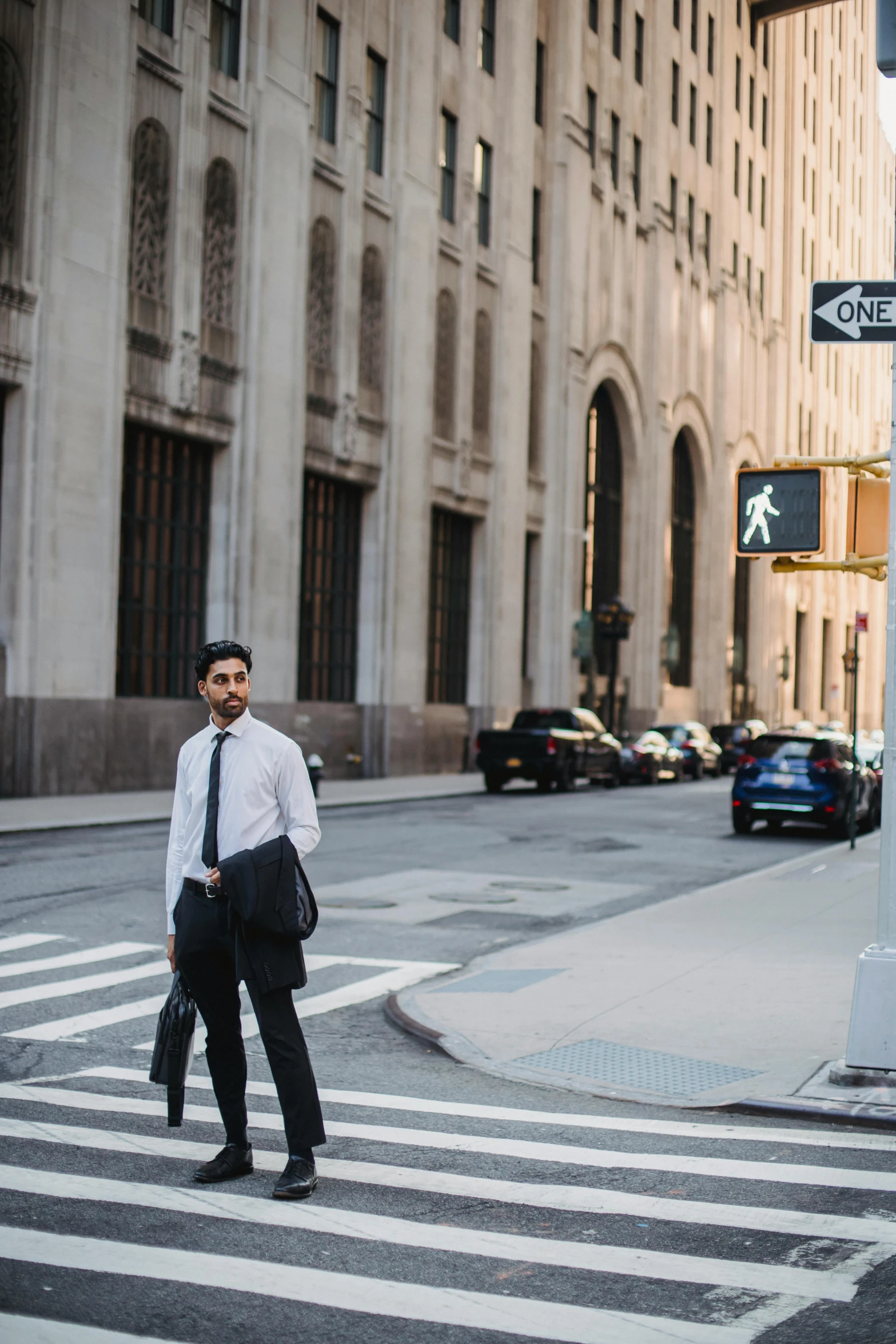 a man stands on the side of the road