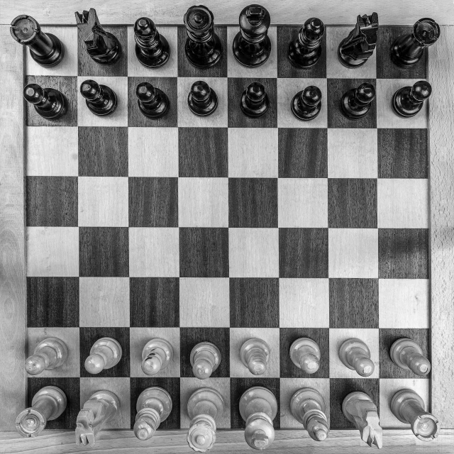 a chess board with many different pieces on it