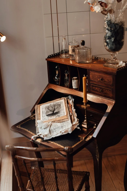 a desk with a piano and books on it