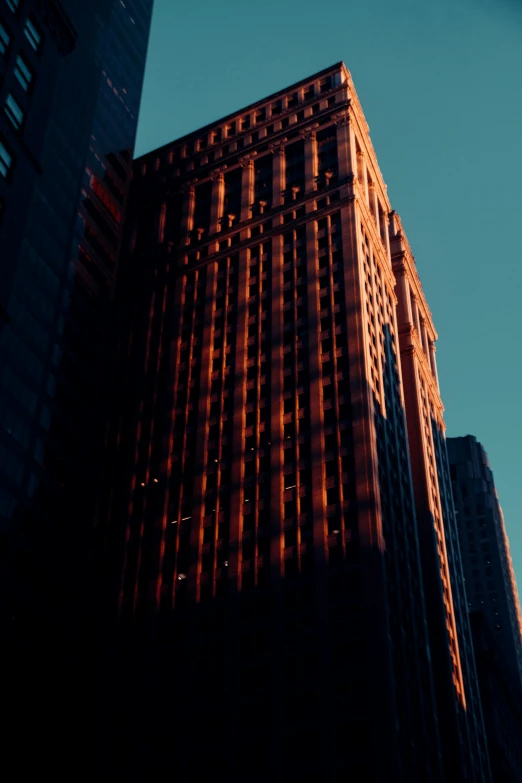 there is a very large red brick building in the city