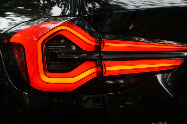 a car taillight showing the red lights on it