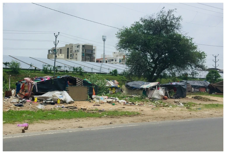 a large dirty field with many piles of trash