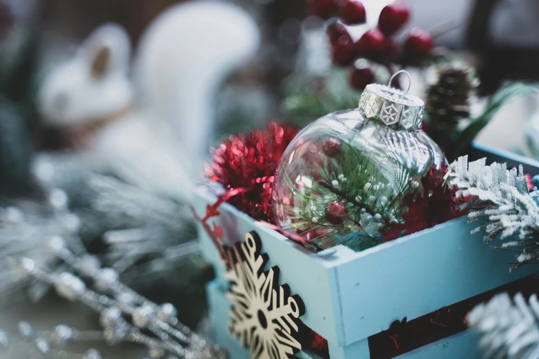 some ornaments are placed inside a box