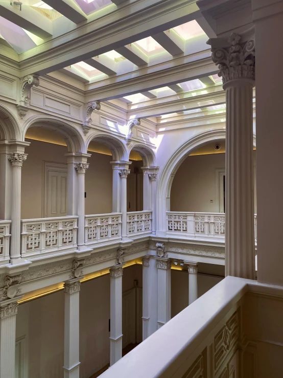 the interior of a large building with a staircase