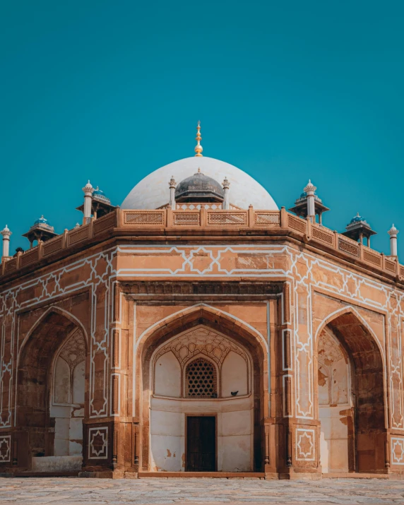 a building with several arches and domes on top