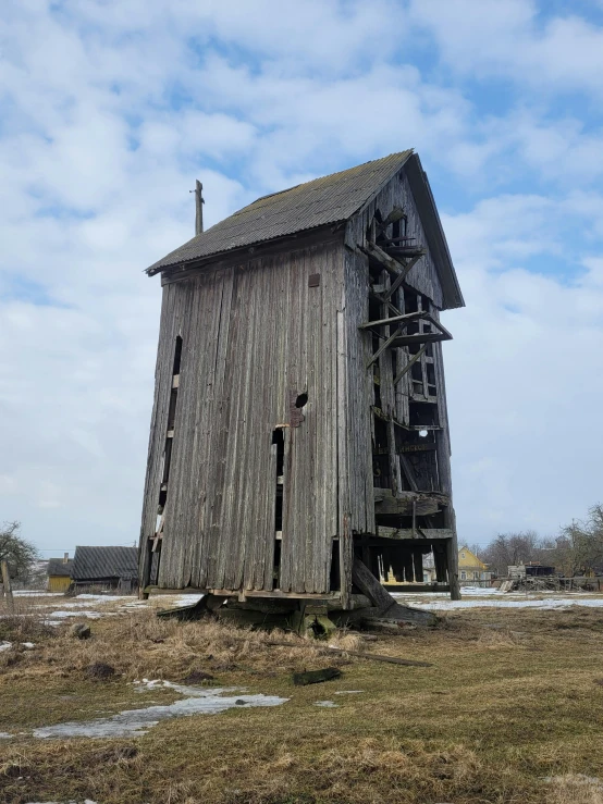 a wooden structure with stairs up to it