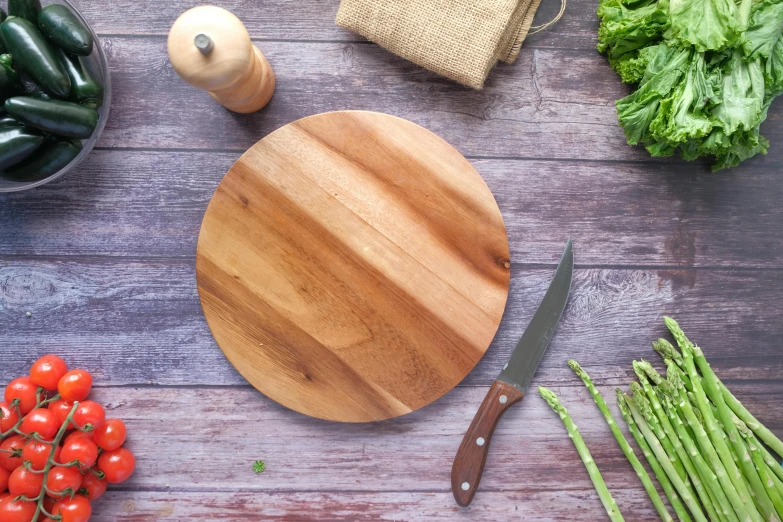 fresh vegetables, asparagus and peppers are arranged in a table