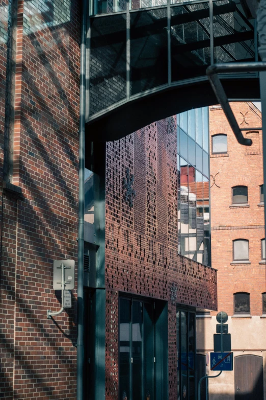 the outside entrance of an office building has a brick structure