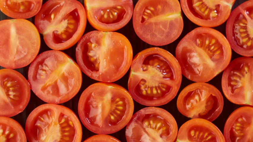 some cut up tomatoes on top of each other