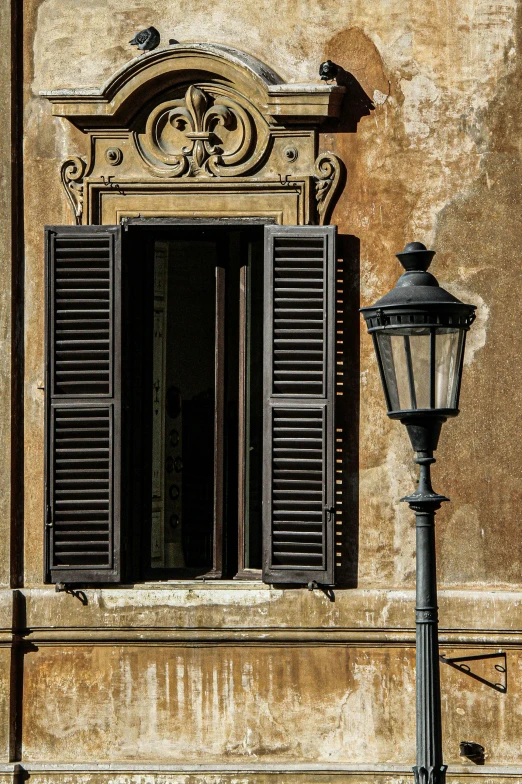 a street light and window on a side walk