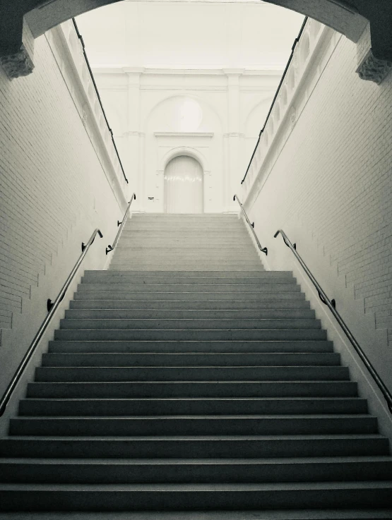 black and white image of a stair case