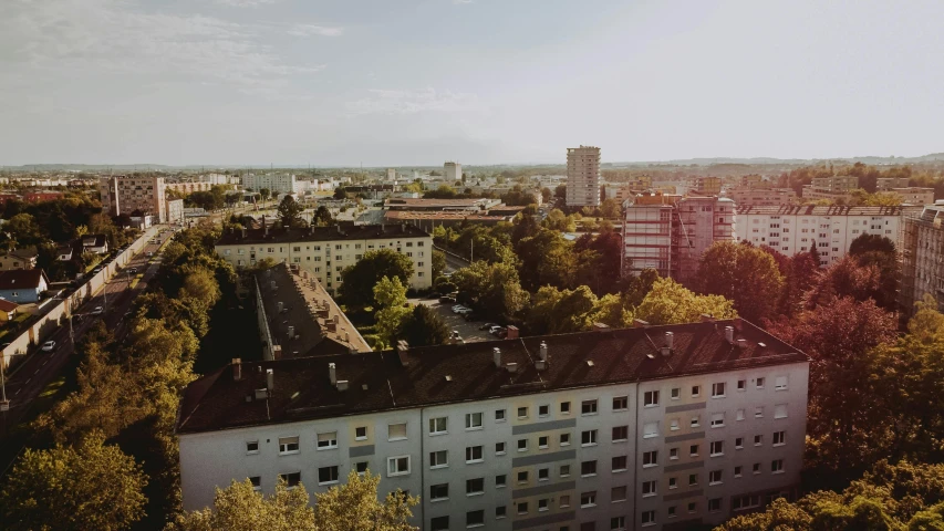 an aerial s of a city with trees and buildings