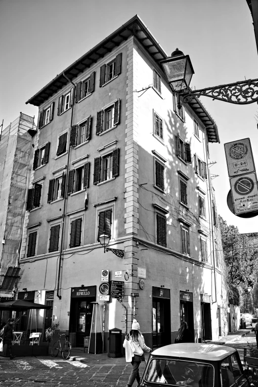 a black and white po of a building with lots of windows