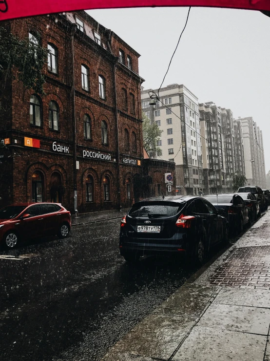 a view down an alleyway in the rain