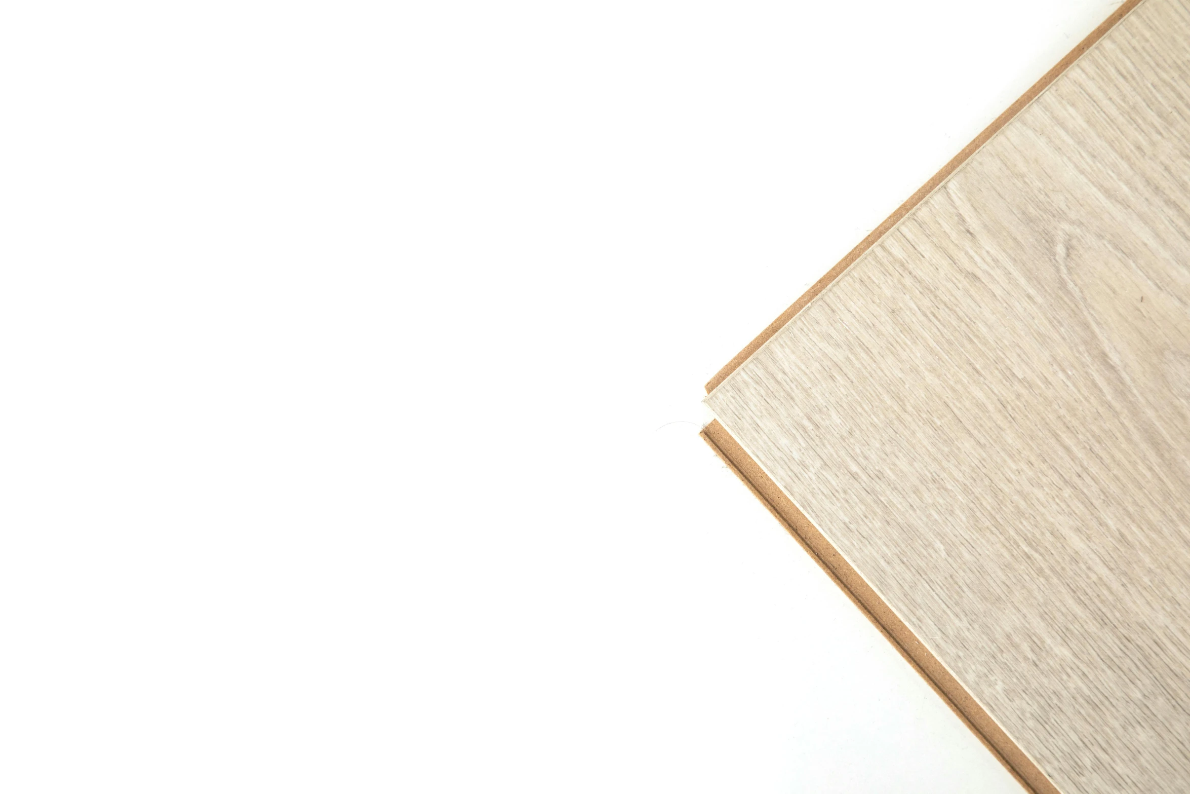 a wood grain textured board on white background