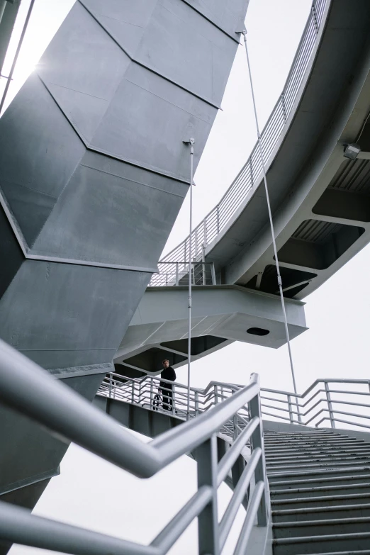 a person climbing up some stairs on a boat