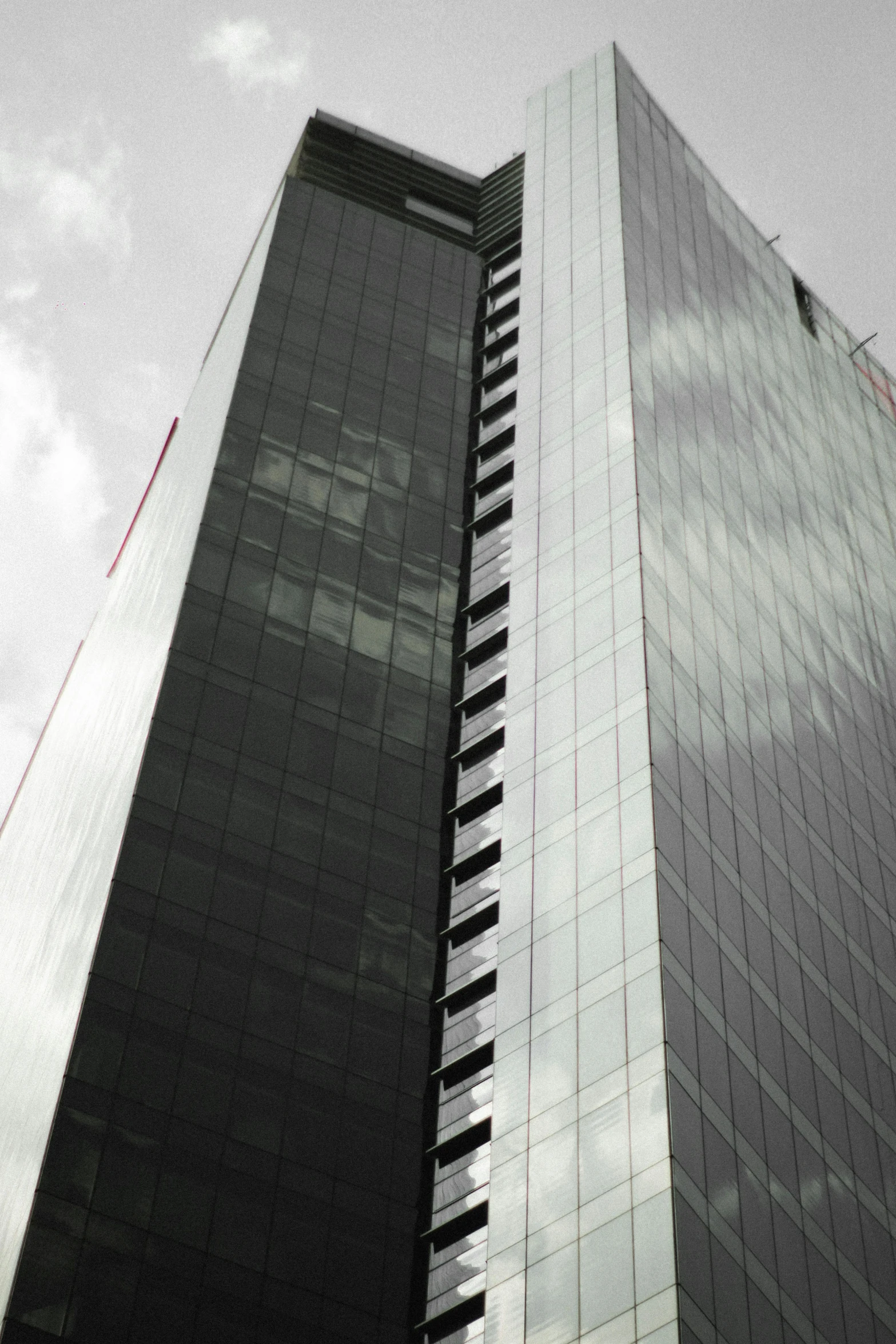 a very tall building with some reflections on it