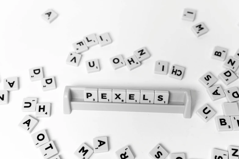 there are several scrabbles that have different words written across them