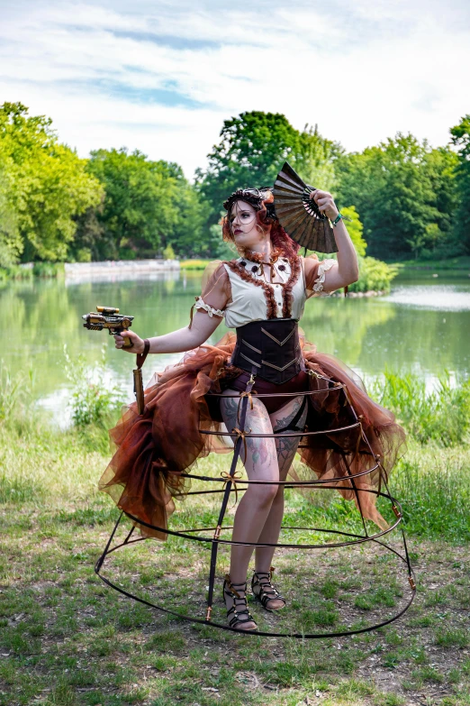 a woman with brown hair is sitting in a chair