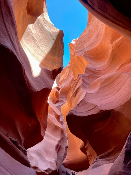 a man riding through an arch of some sort