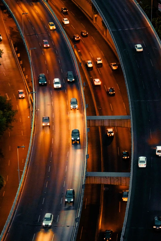 the freeway is busy with many cars moving on it