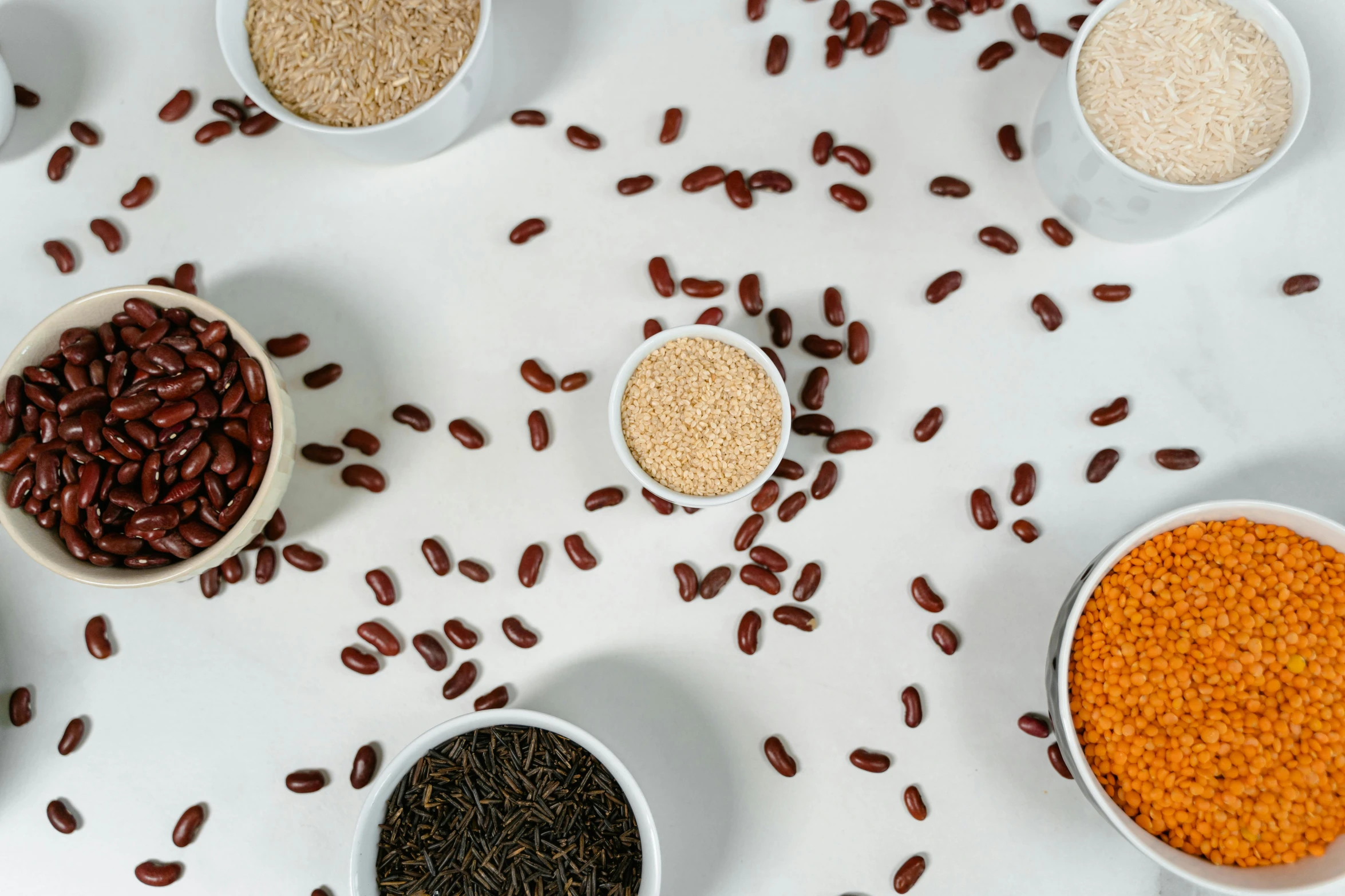 several bowls are shown in different types of cereal