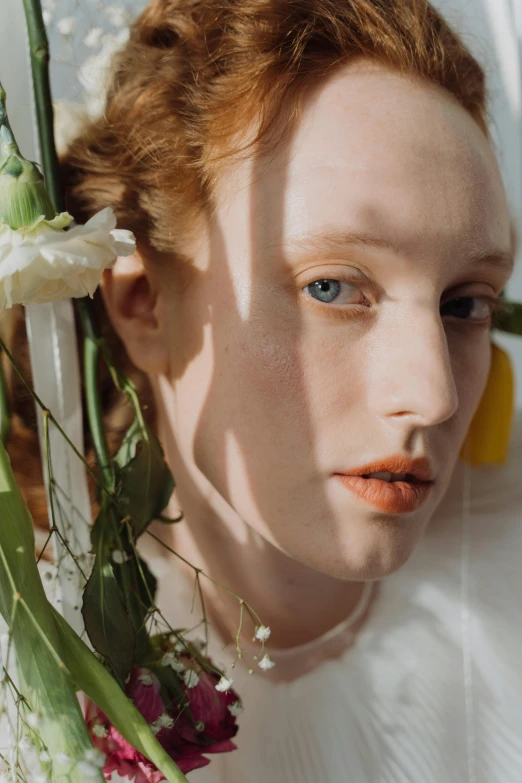 a woman with flowers around her neck