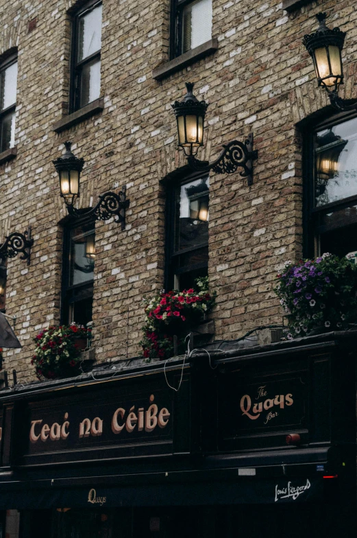 there is an outdoor restaurant with brick walls and windows