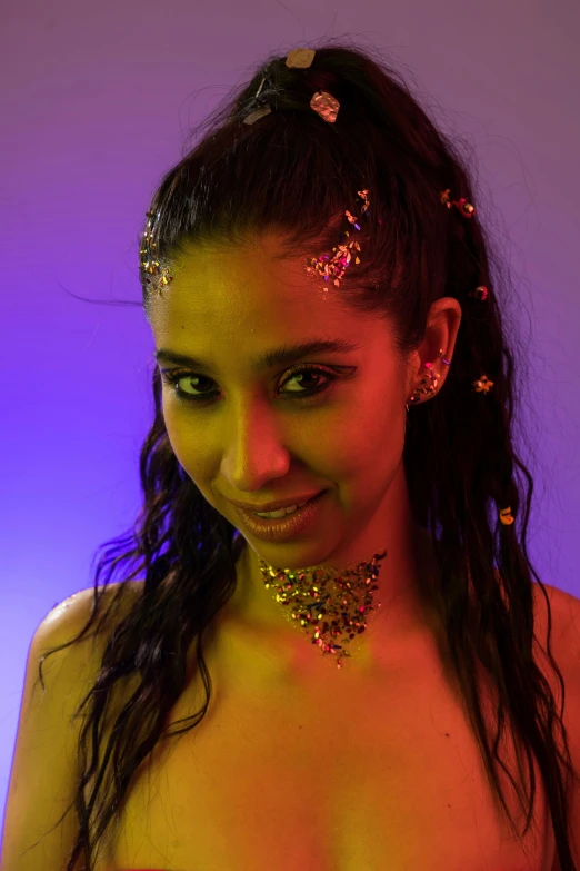 young woman with jewelry looking at camera