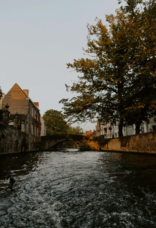 there is a canal going through some old houses