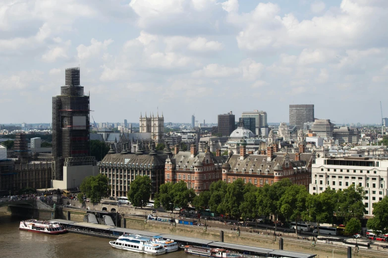 a waterway in london and a small boat is floating down