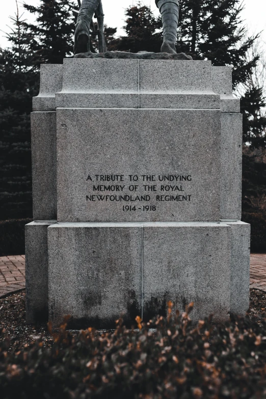 there is a very nice memorial of a man on a bench