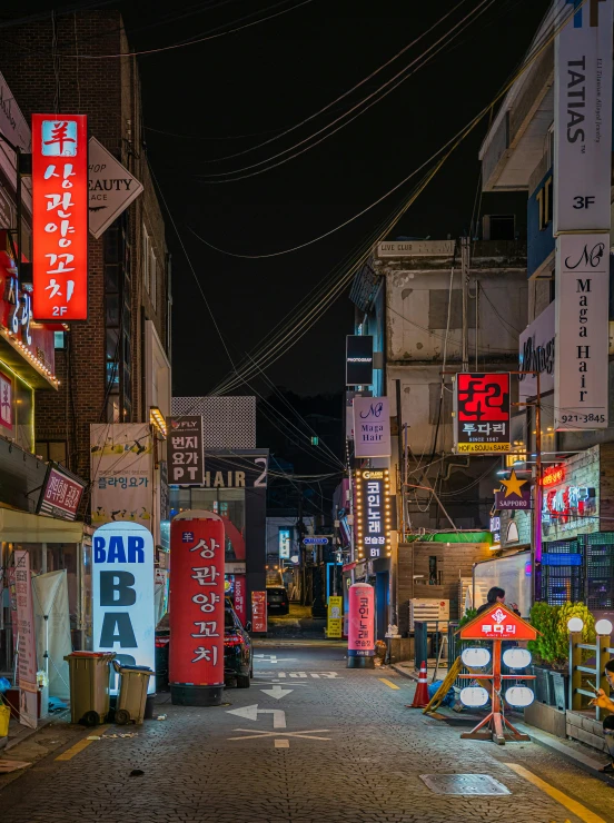 an image of a street scene at night