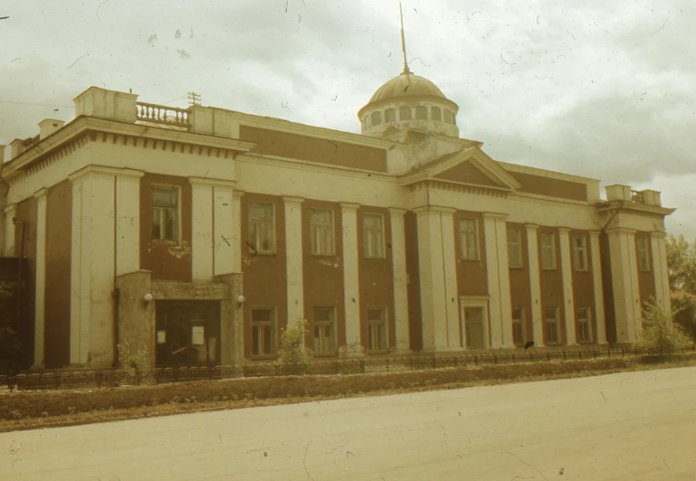 a building on the side of a road