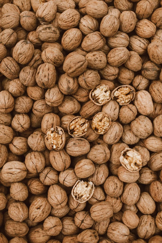 walnuts in a bowl and nuts for sale