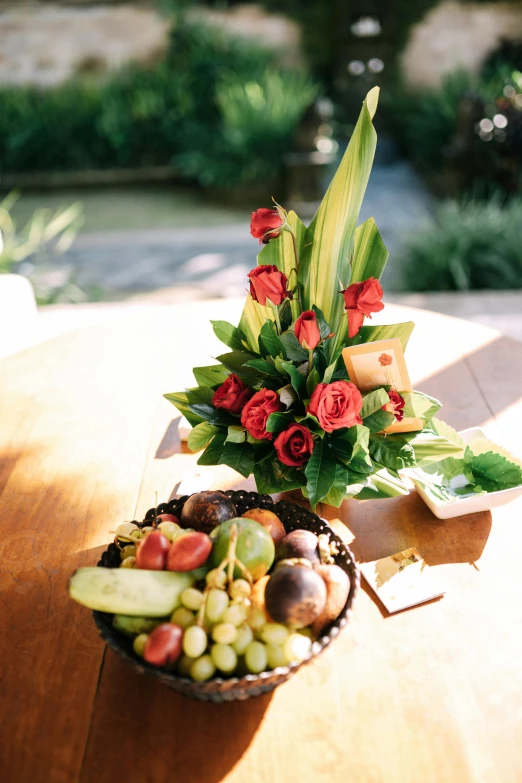 a bowl filled with assorted fruit and vegetables