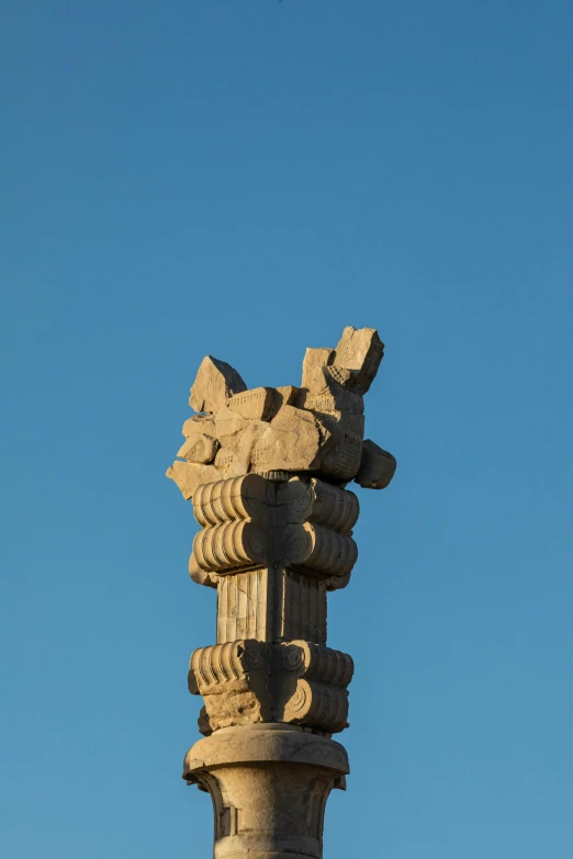 the column top of a building is made from stone