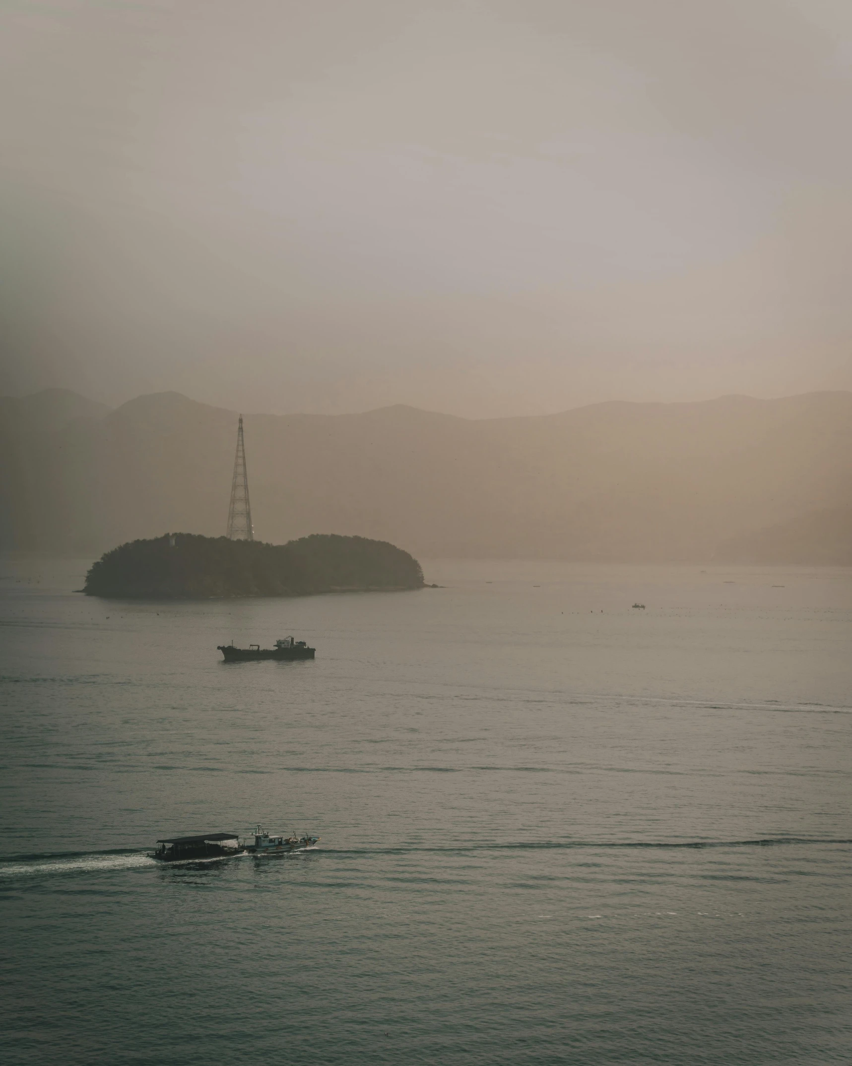 two small boats on a large body of water