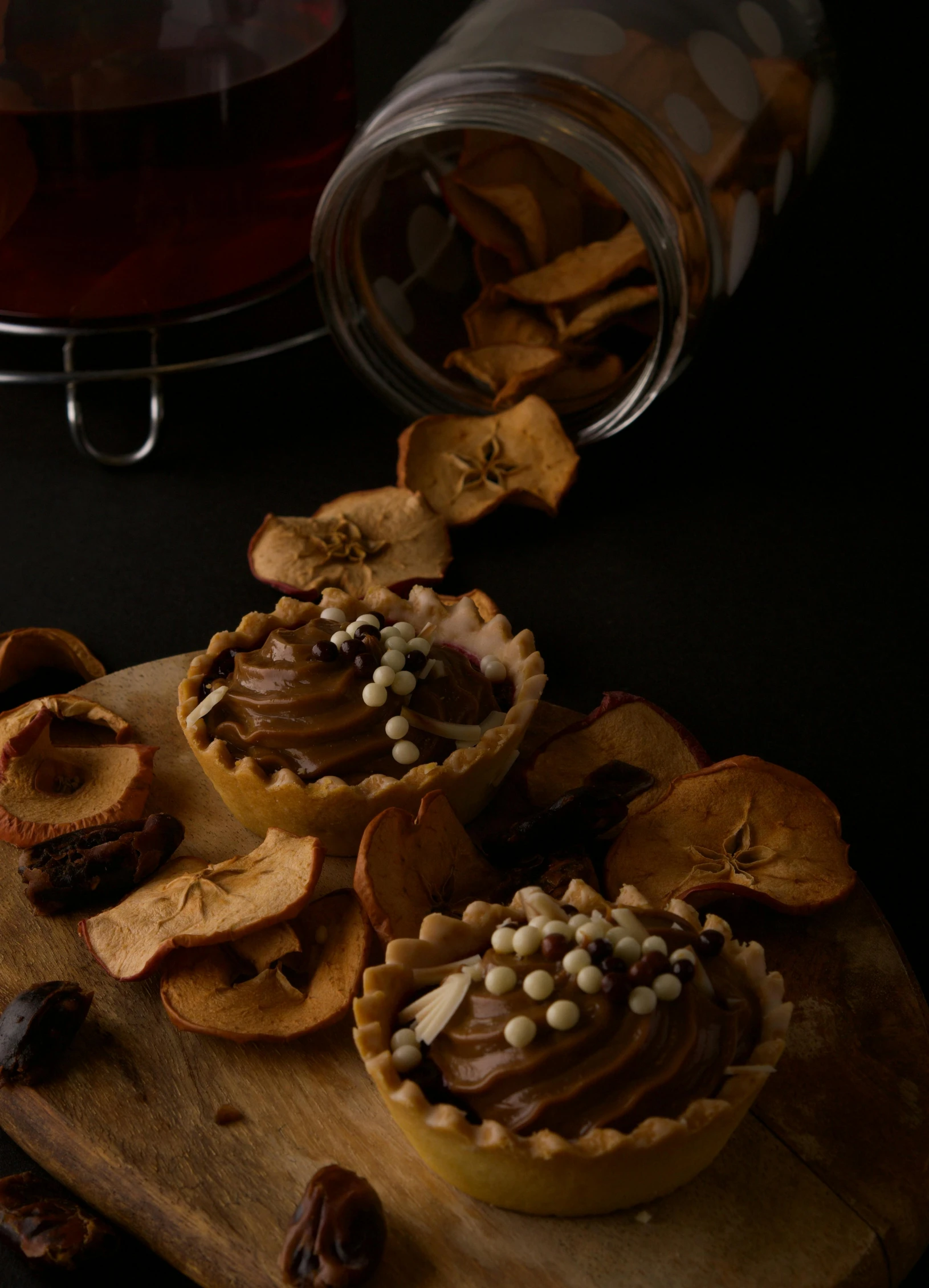 there is a tray with some cookies and nuts on it