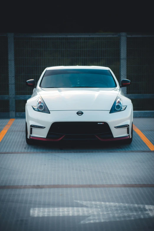 a white car parked in a parking space