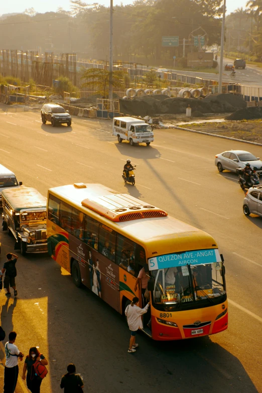 two buses, one of which is a bus and one is a bike taxi