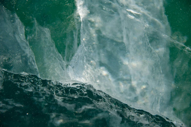 water surface with bubbles and small drops