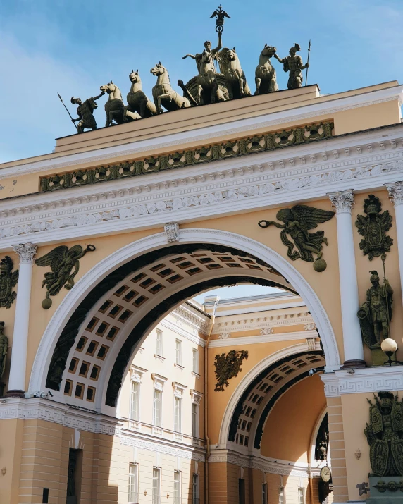 a arch that has statues on it