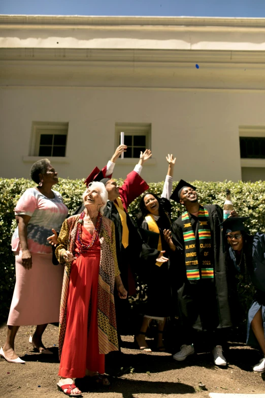 a group of people taking a picture together