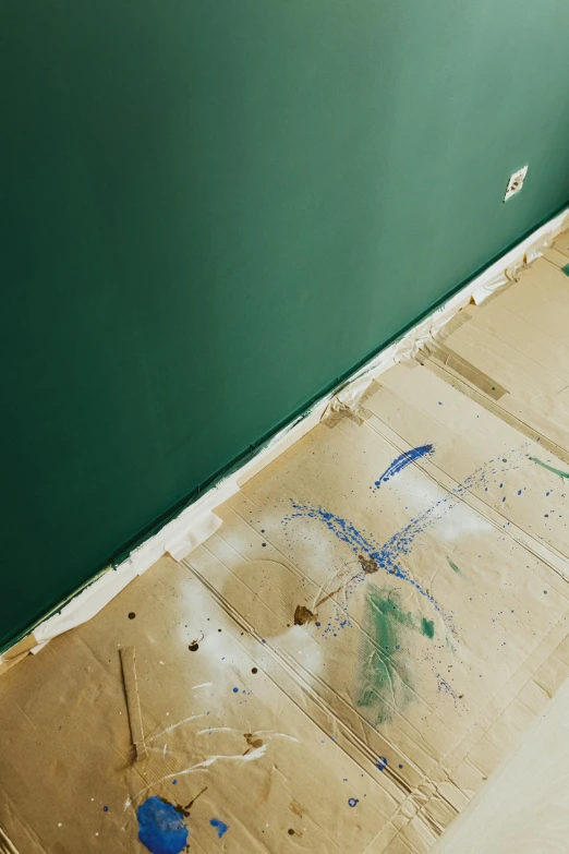 a room with the walls being removed by construction equipment