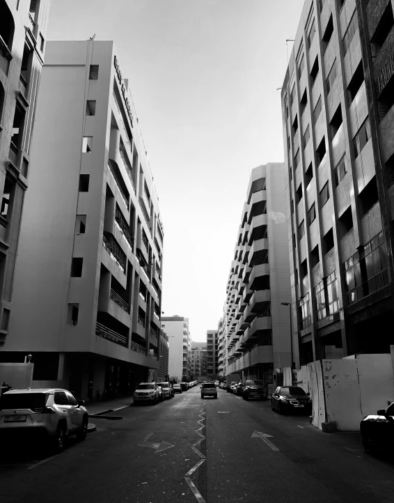 black and white image of a city street