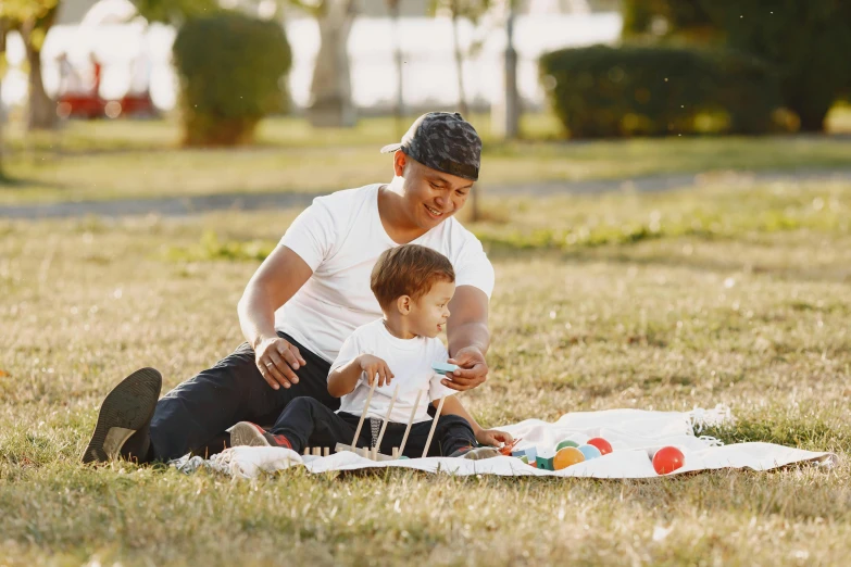 an image of a woman and baby playing with cake