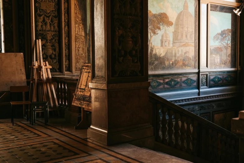 a painting and bench in an old, ornate room