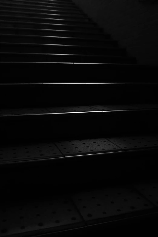 black and white po of the steps leading to an underground staircase