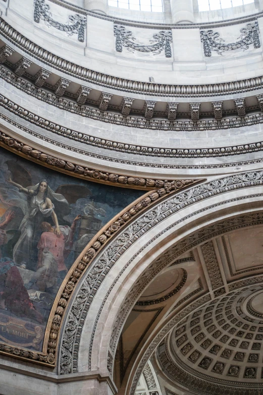 paintings on the ceiling in a large building